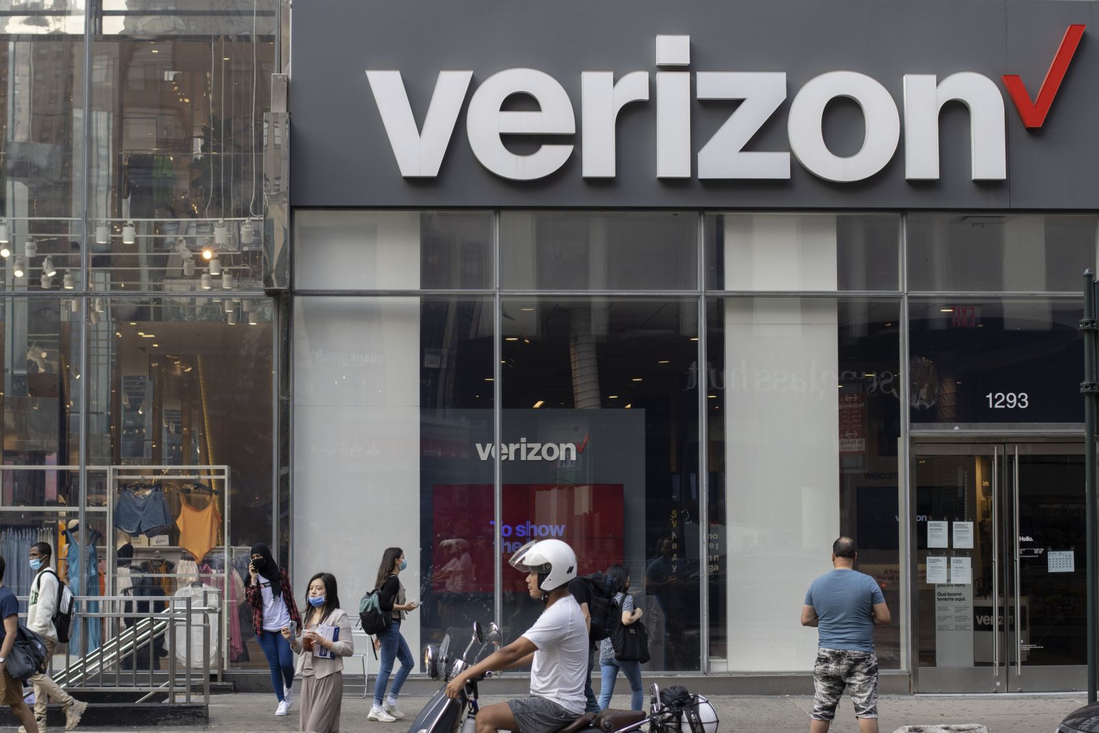 Communication Services - Verizon Communications Inc store front by- hapabapa via iStock